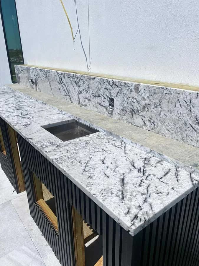IQ+ Cabinetry project — Leathered granite / Tampa Bay