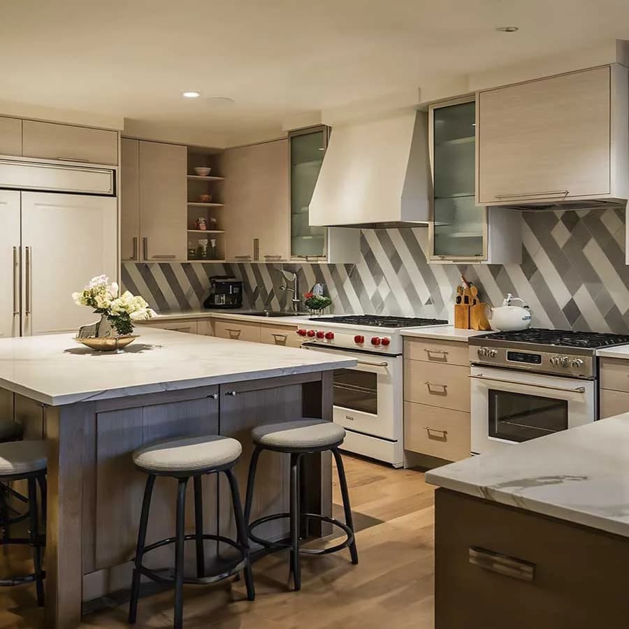 IQ+ custom kitchen with island seating and pendant lighting